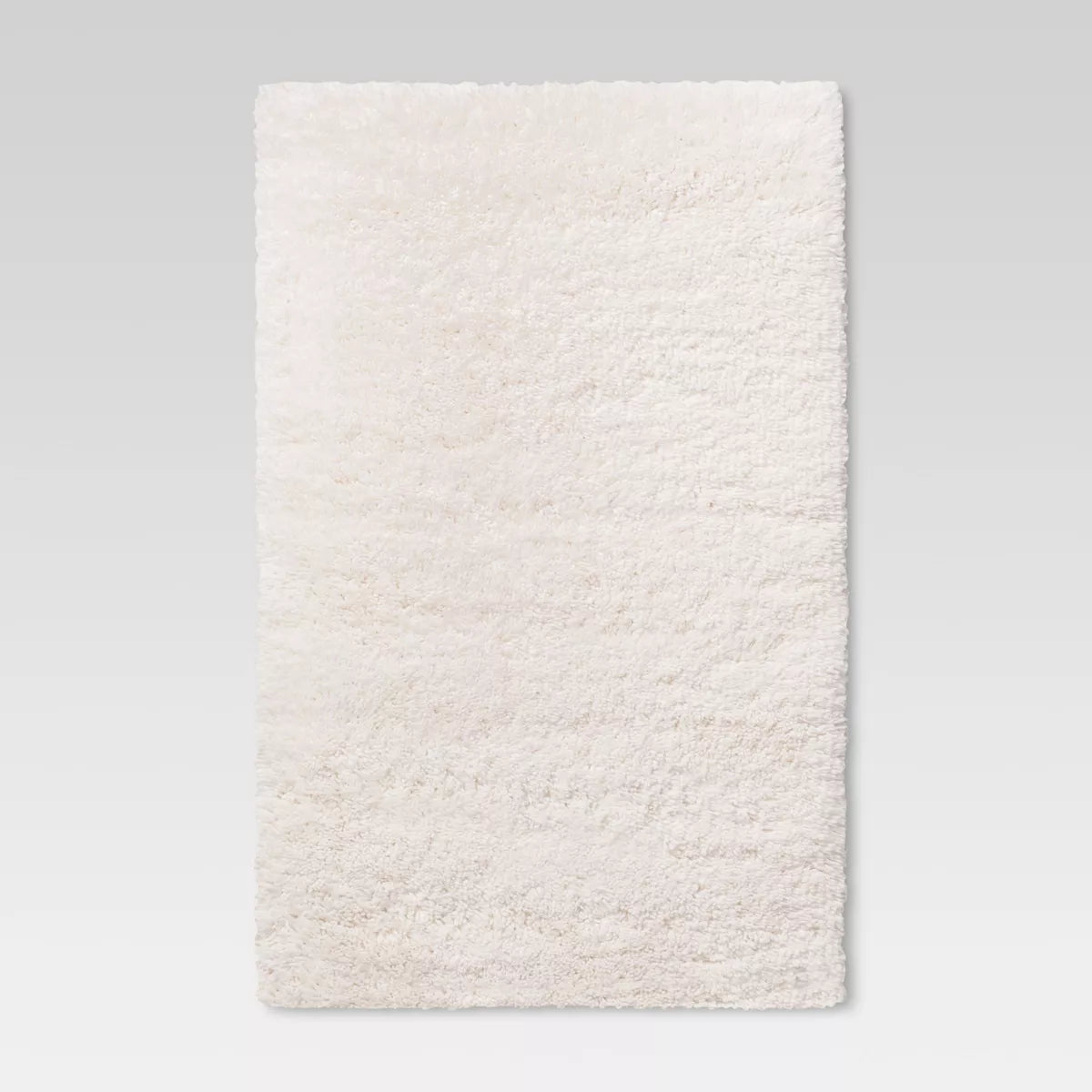 4'x5'6" Cream Plush Shag Washable Accent Rug - Room Essentials™